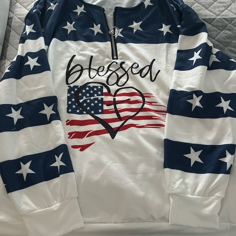 Ladies red, white and blue long sleeve top, 1/4 zip. Brand new, never worn.
